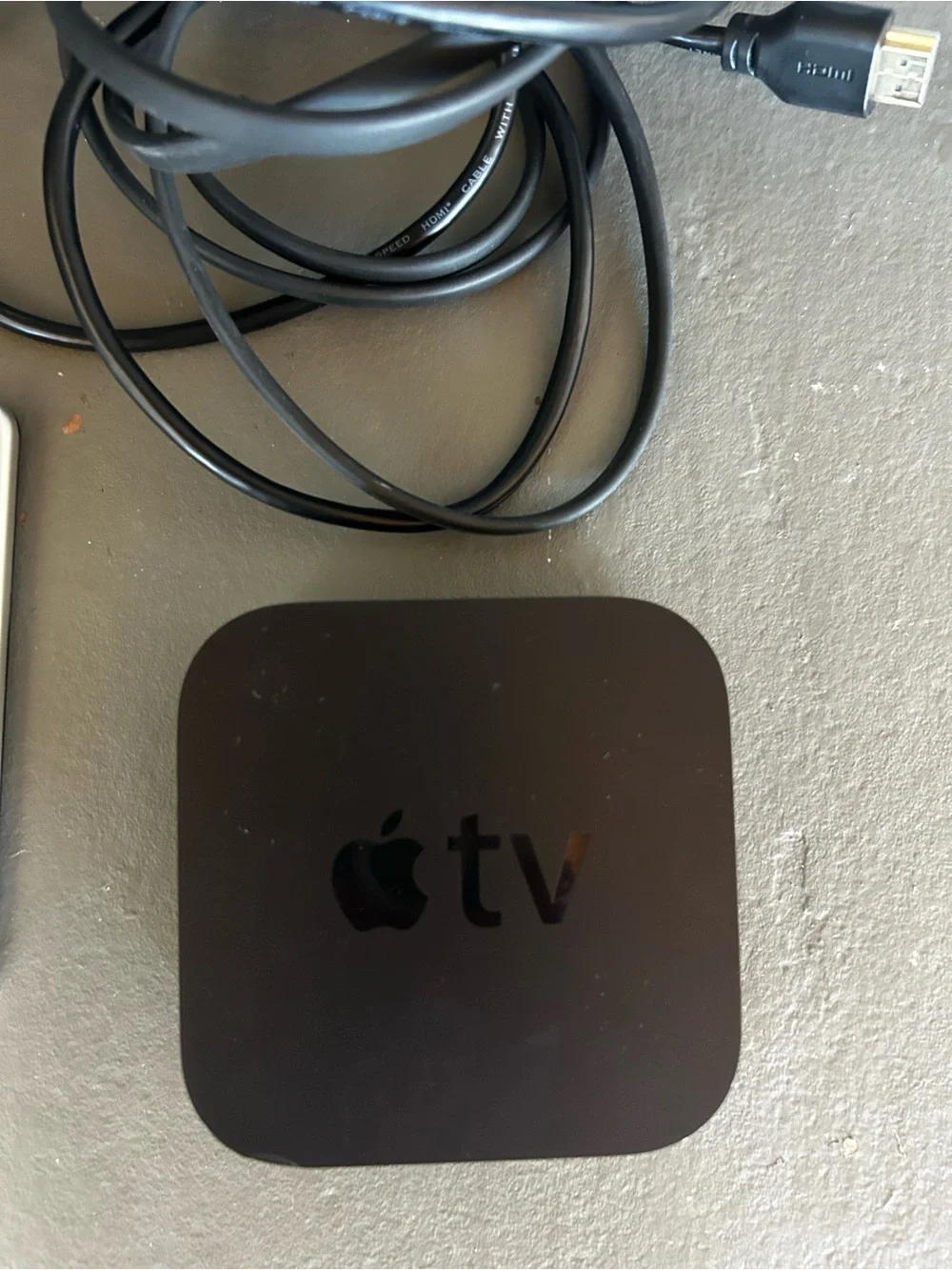 Apple TV box with Siri Remote and cables - Black Gen 4
